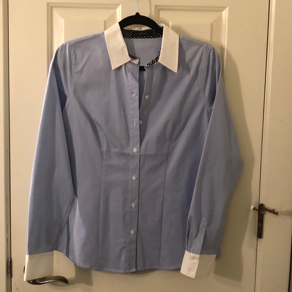 The limited light blue and white button up